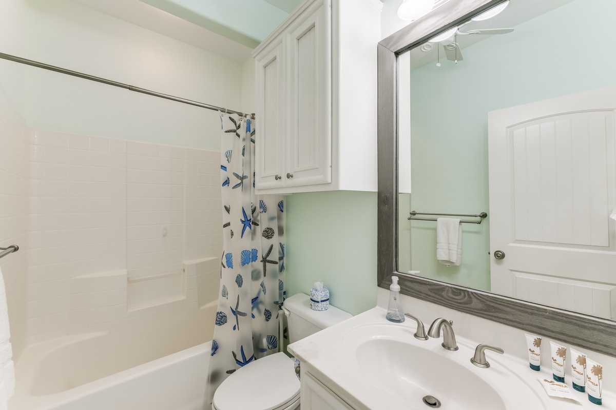 Your refreshing bathroom features a peaceful mint palette with thoughtful touches like premium toiletries and soft towels waiting for your arrival.
