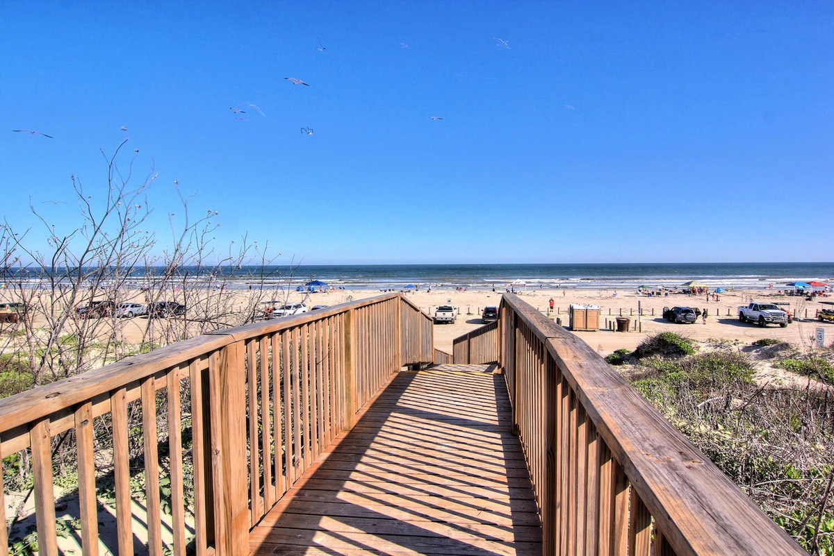 Sunrise Villas walkway to the beach