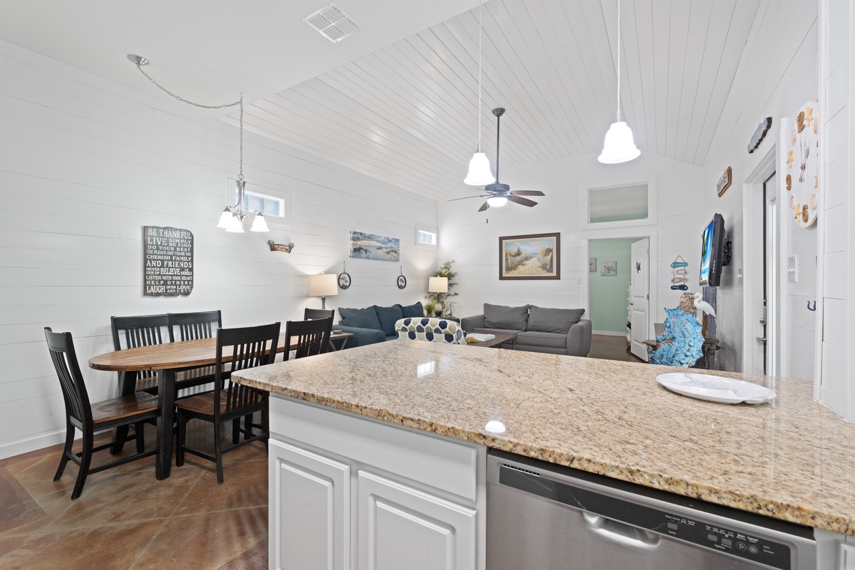 Your bright, open-concept kitchen flows seamlessly into the dining and living areas, perfect for gathering and creating memories together.