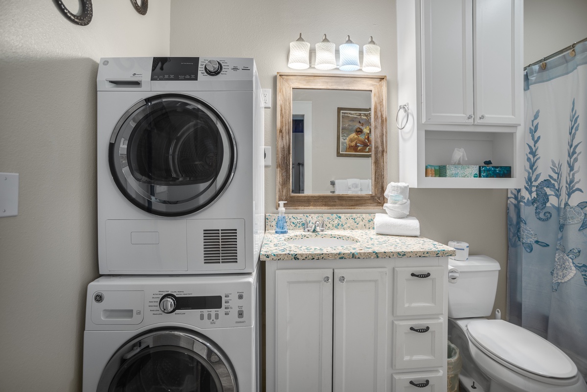 Your private laundry room combines convenience with comfort—fresh towels, full-size washer and dryer, and a beautiful vanity for getting ready.