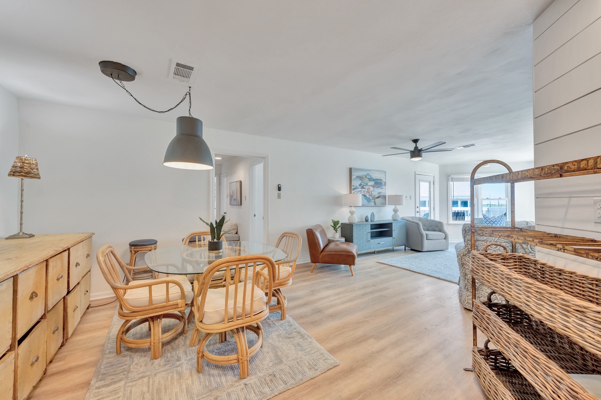 Your bright, coastal-inspired living space flows seamlessly from dining to lounge, perfect for gathering with loved ones in comfort and style.