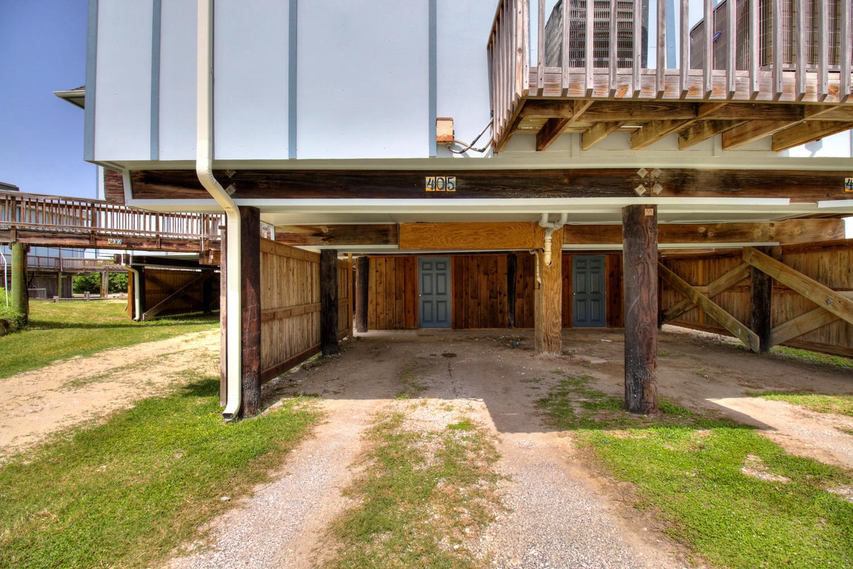 Covered parking area beneath the property provides convenient storage for your vehicle and gear during your stay.