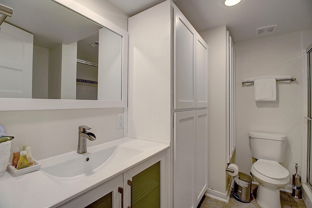 Your private bathroom features modern fixtures, ample storage, and thoughtful amenities to start your day refreshed.