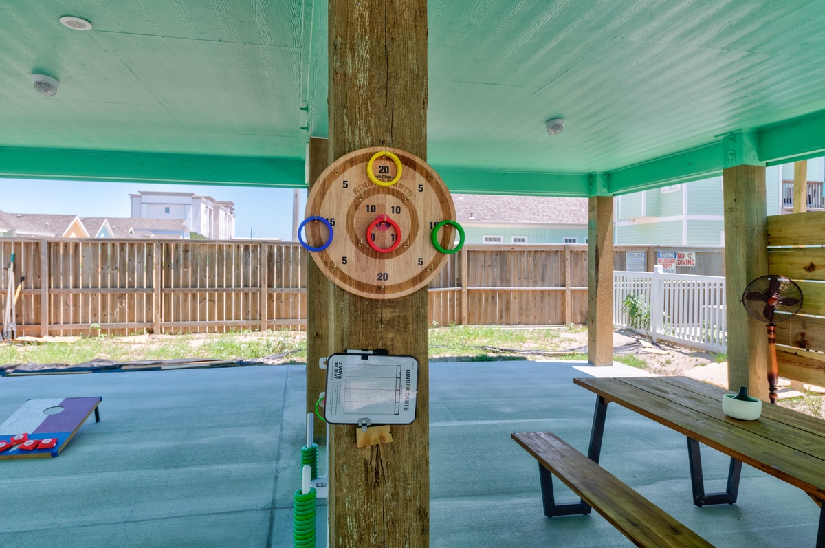 Your own covered game area with a fun ring toss station awaits - perfect for friendly competition and making memories with family.