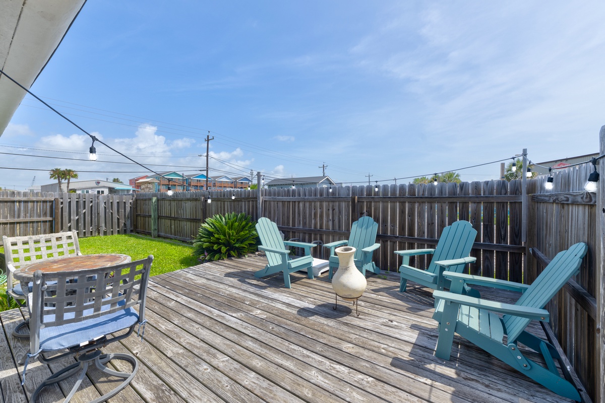 Sip your morning coffee or unwind at sunset on your private deck, complete with Adirondack seating and a laid-back coastal vibe.