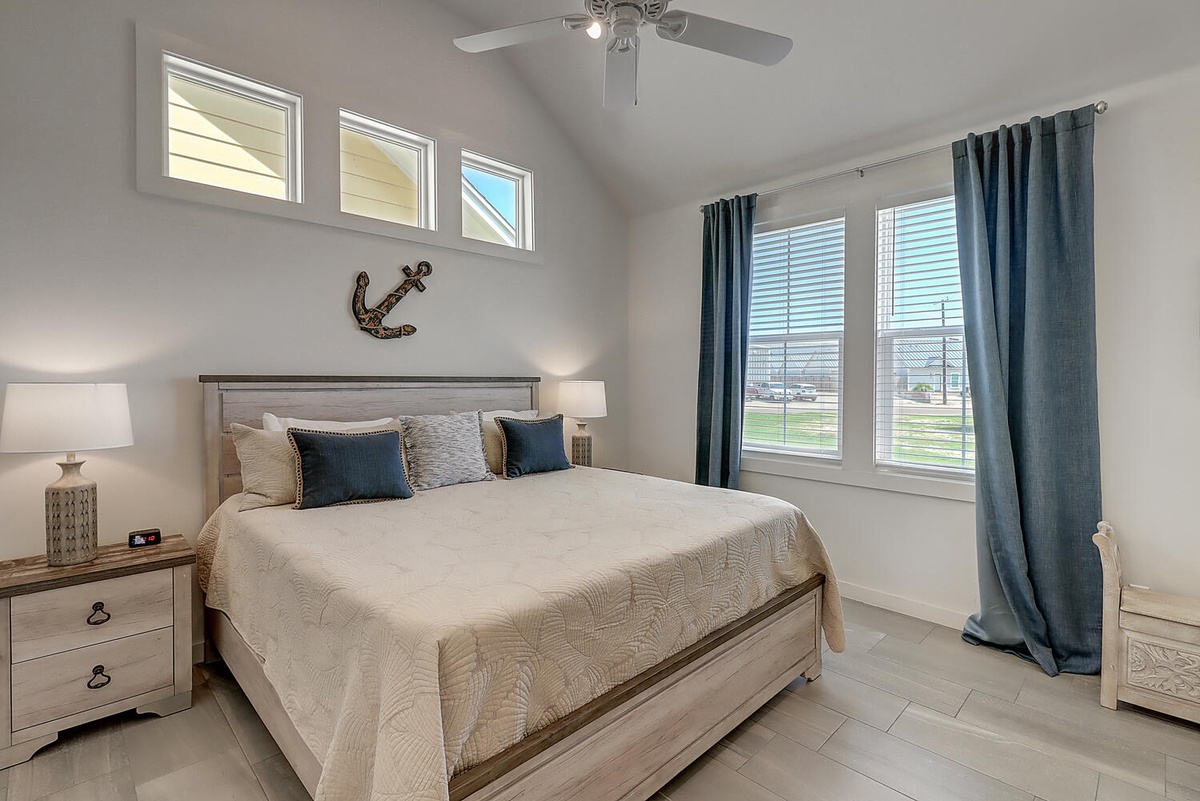 Rest peacefully in your coastal-themed bedroom with crisp linens and nautical touches creating the perfect seaside retreat atmosphere.