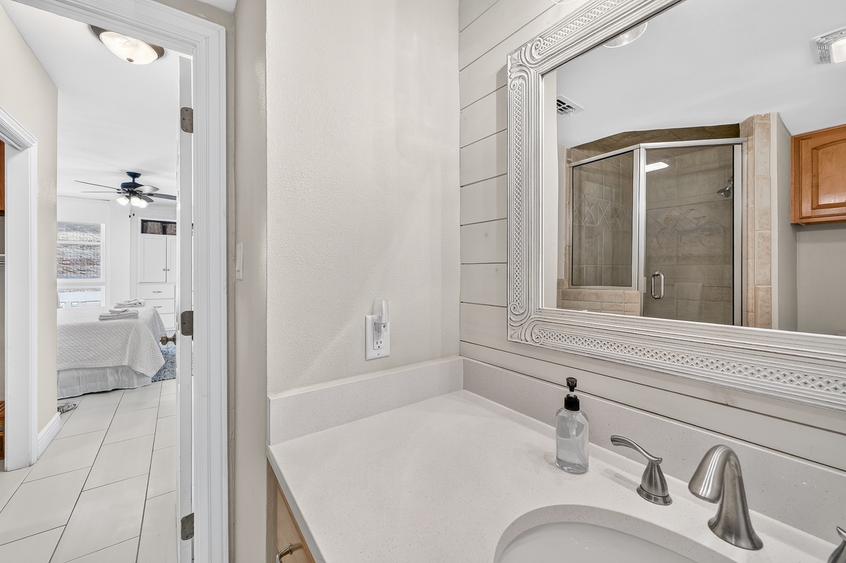 Freshen up in your bright, welcoming bathroom with modern finishes and a spa-style shower just steps from your peaceful bedroom retreat.