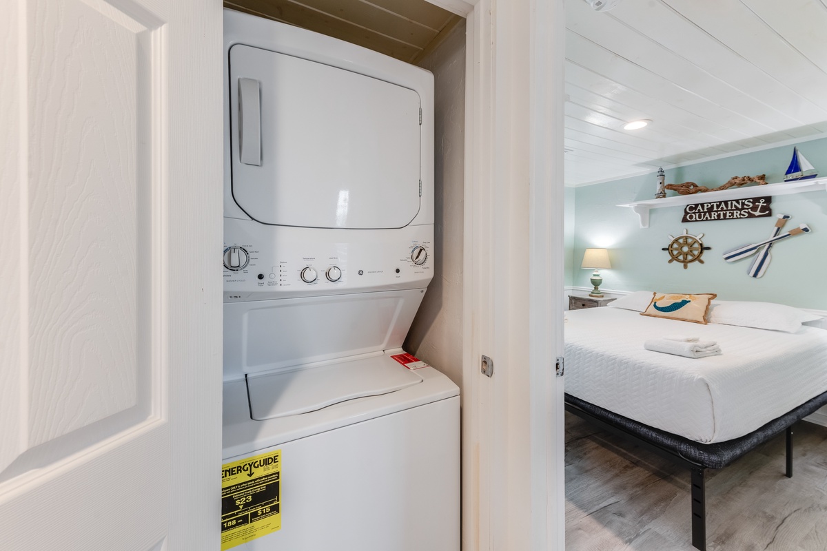 Your in-unit washer and dryer keep you comfortable throughout your stay, while nautical-themed decor creates a coastal retreat.