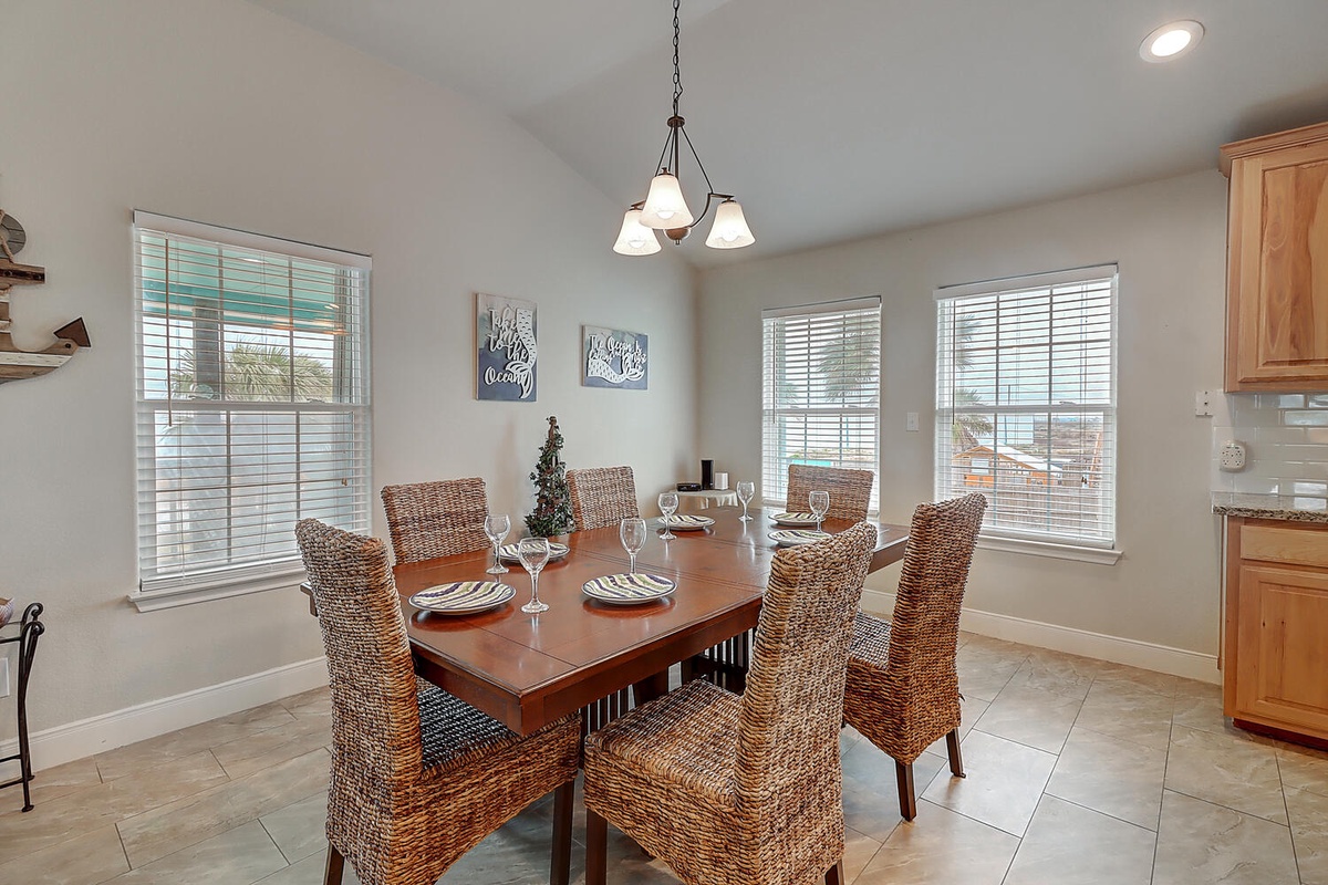 Gather around this elegant dining table where memorable meals and conversations await your group.