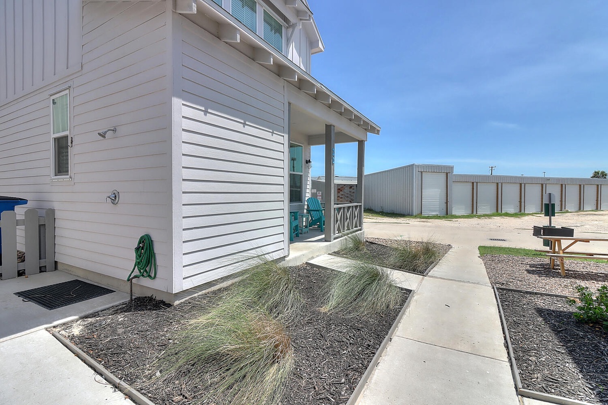 Modern beachside property with clean white siding and coastal-inspired design elements.
