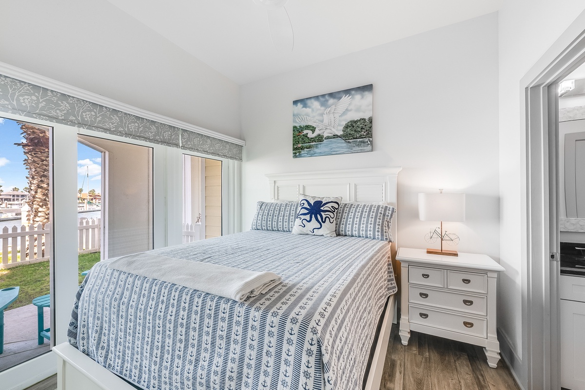 Wake up to natural light streaming through your bedroom windows, with coastal decor creating a peaceful retreat for restful nights.