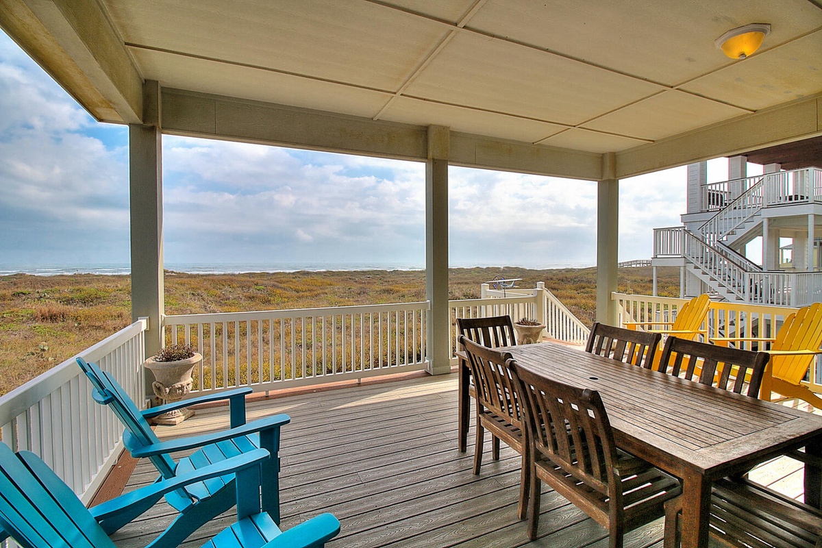 Your covered deck offers the perfect spot to dine al fresco while taking in stunning natural landscape views.