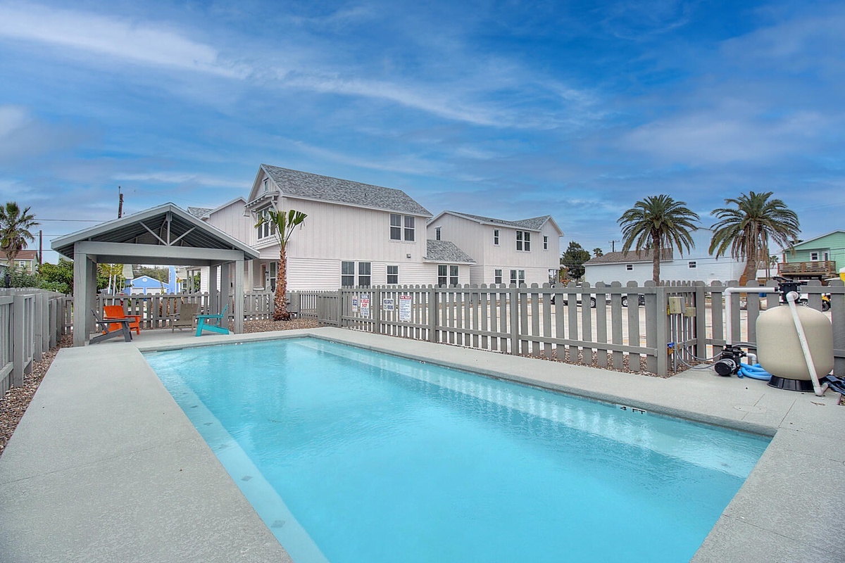 Dive into crystal-clear waters in your private pool paradise. Relax under the covered pavilion or soak up Florida sunshine surrounded by swaying palms.