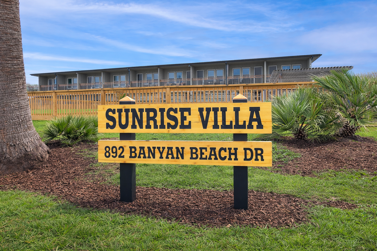 Welcome to Sunrise Villa, a beachside retreat surrounded by tropical landscaping and modern accommodations.