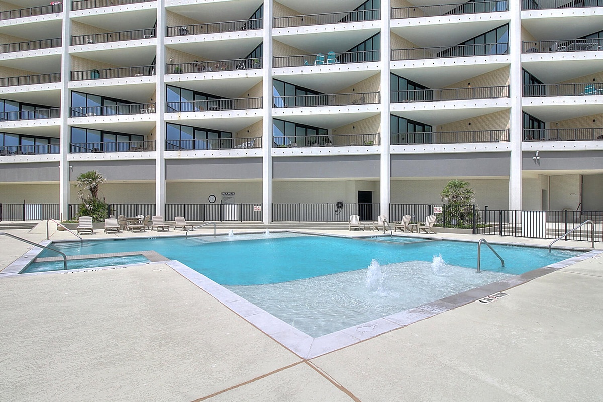 Dive into relaxation at this sparkling pool where you can unwind under the sun with comfortable loungers nearby.