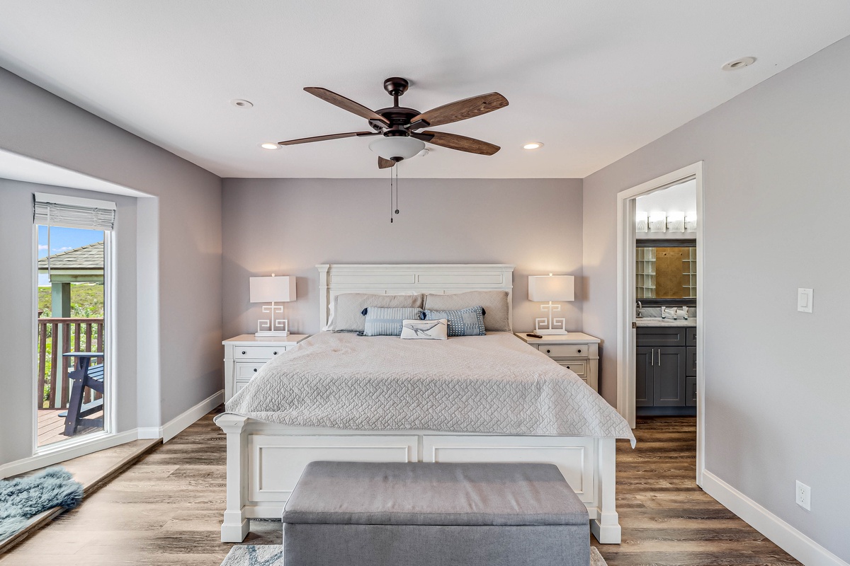 Relax in your serene master bedroom with plush bedding, private balcony access, and an elegant en-suite bathroom for ultimate comfort.