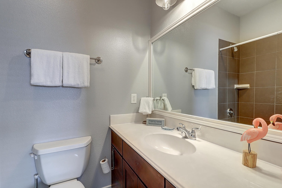 Your private bathroom features crisp linens and thoughtful touches, creating a clean, comfortable space for your daily routines.