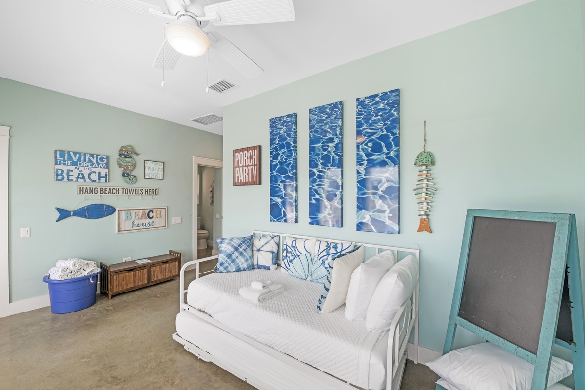 Drift off to sleep in your coastal-themed bedroom, where ocean blues and beach decor create the perfect seaside sanctuary for your getaway.