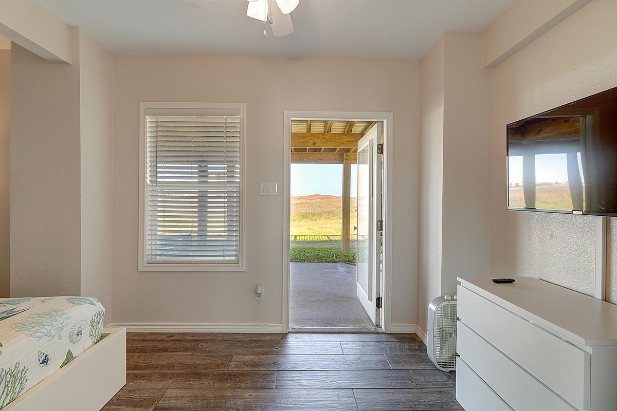 Wake up to stunning landscape views from your bedroom, with direct patio access for morning coffee and fresh air.