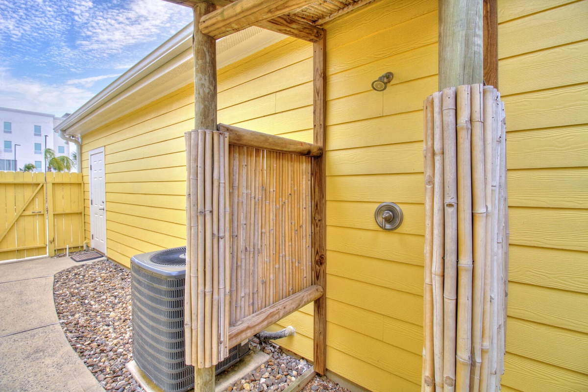 Rinse off the salt and sand in your private bamboo outdoor shower, perfectly positioned for post-beach refreshment.