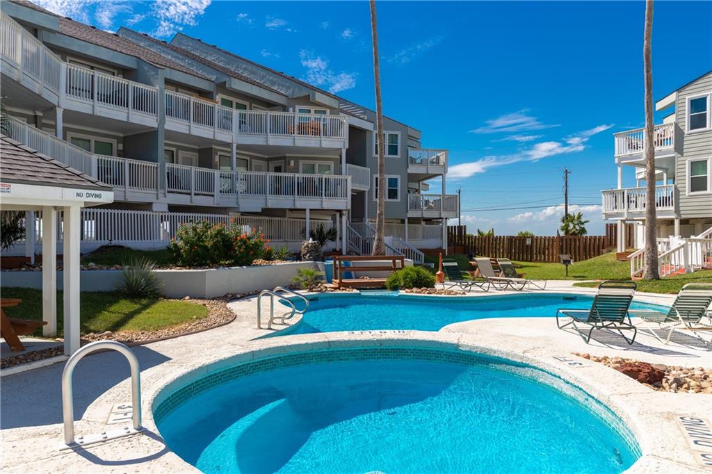 Cool off in your sparkling pool and soak in the bubbling hot tub surrounded by coastal charm and endless blue skies.