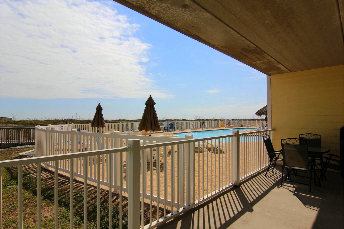 Step onto your private balcony and enjoy stunning pool views while savoring your morning coffee in the fresh ocean breeze.