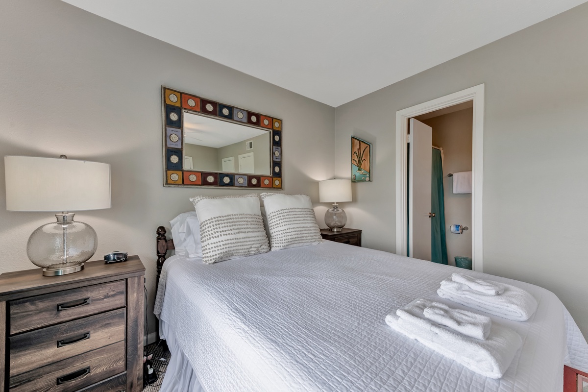 Sink into plush bedding and enjoy the stylish decor in your peaceful bedroom retreat, complete with thoughtful touches and fresh towels.