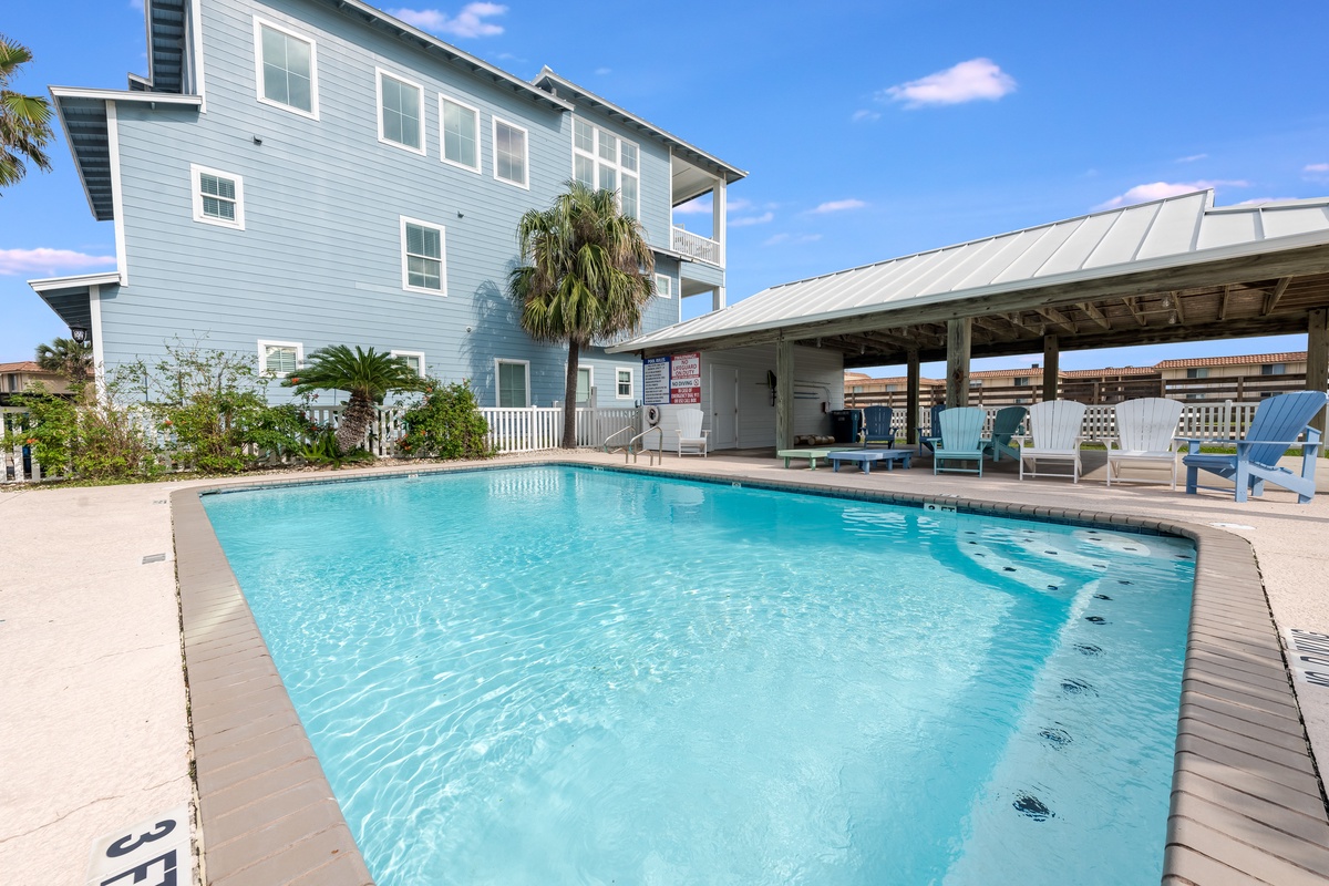 Dive into crystal-clear waters where your worries dissolve - this sparkling pool awaits your perfect vacation moments.