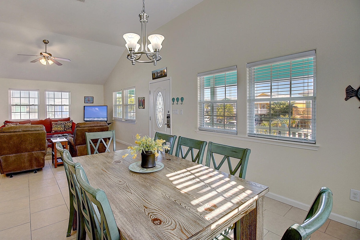 Gather around your rustic dining table where morning light streams through windows, creating the perfect spot for memorable meals together.