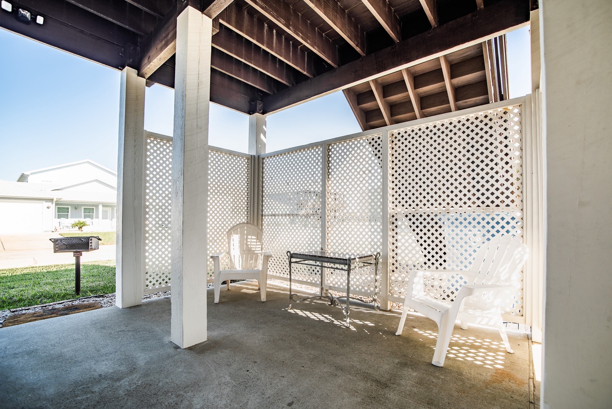 Your private covered patio offers peaceful morning coffee moments with stylish seating and privacy screens.