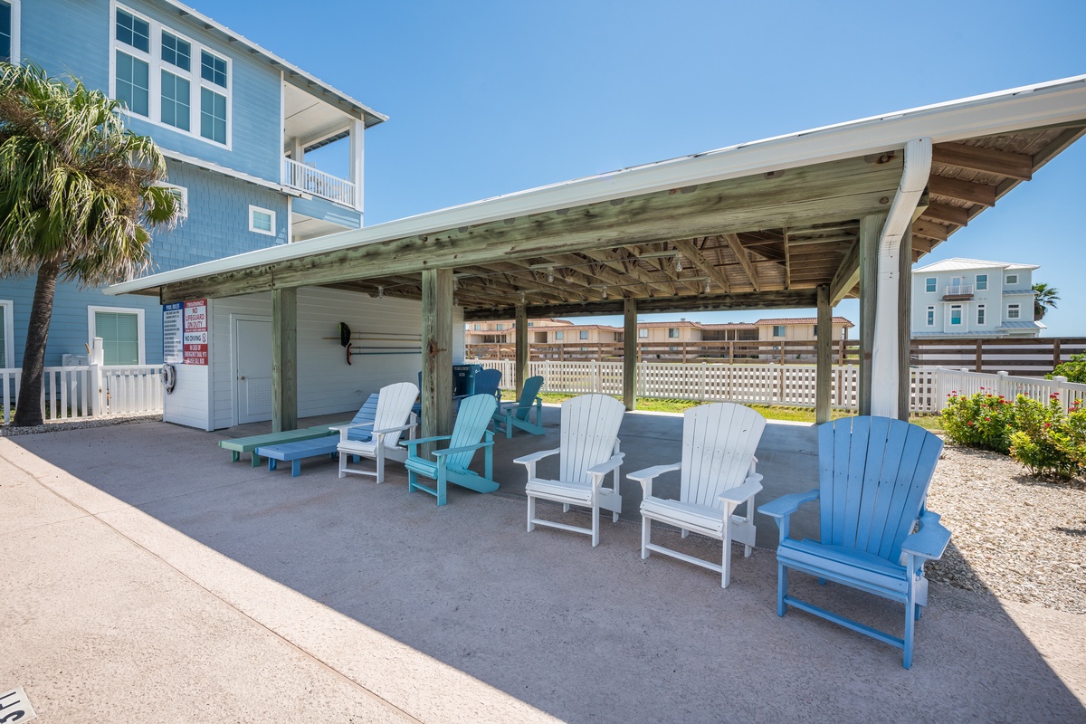 Relax in colorful Adirondack chairs under your private covered patio, perfect for morning coffee or evening conversations.