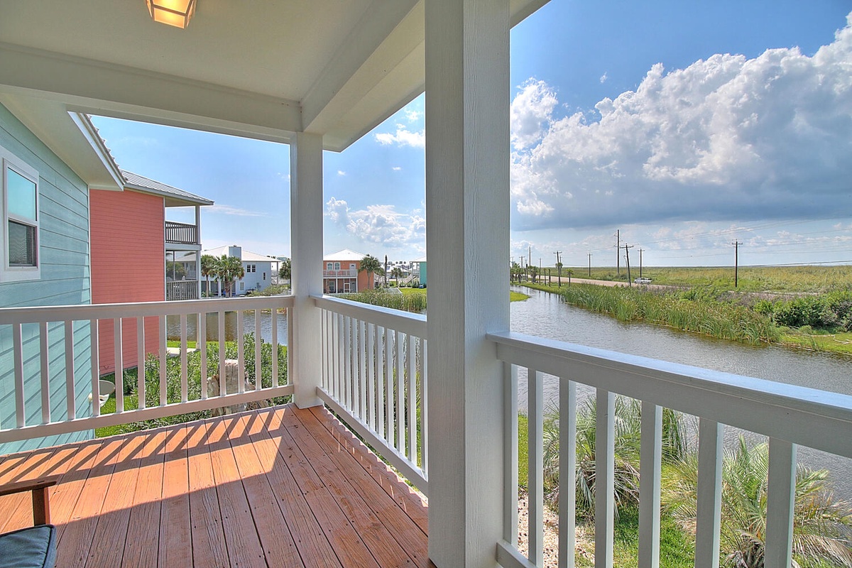 Step onto your private balcony and breathe in the fresh coastal air while watching peaceful canal views unfold before you.