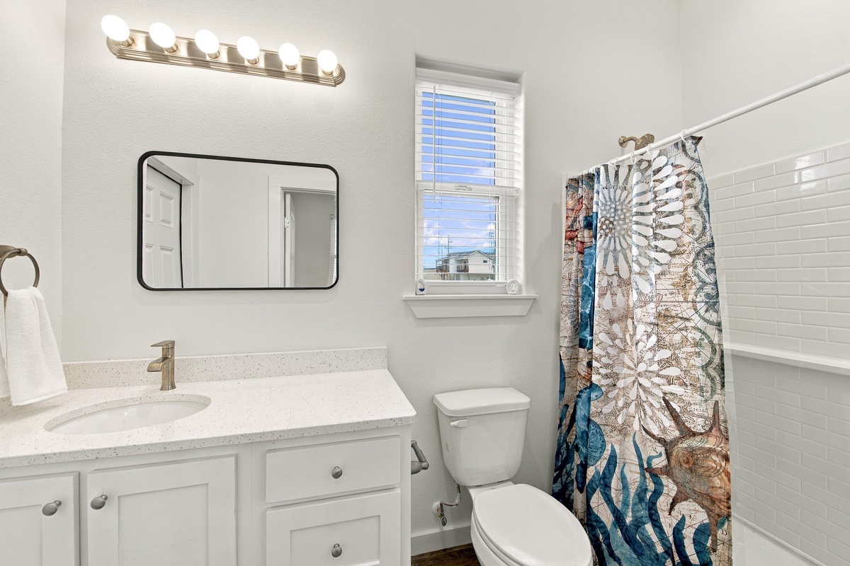 Freshen up in your private bathroom with a tub/shower combo, a spacious vanity and gleaming fixtures.