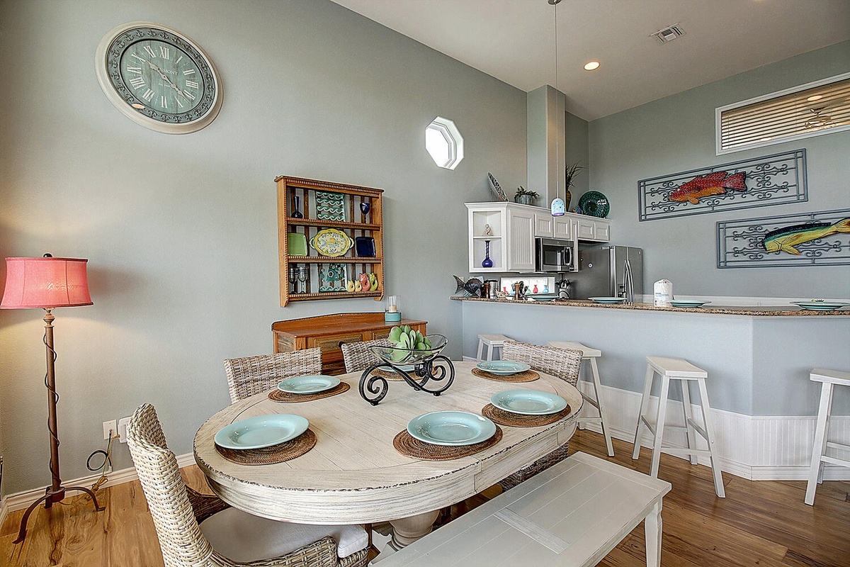 Your open-concept dining space flows beautifully into the full kitchen, perfect for shared meals and relaxed conversations.