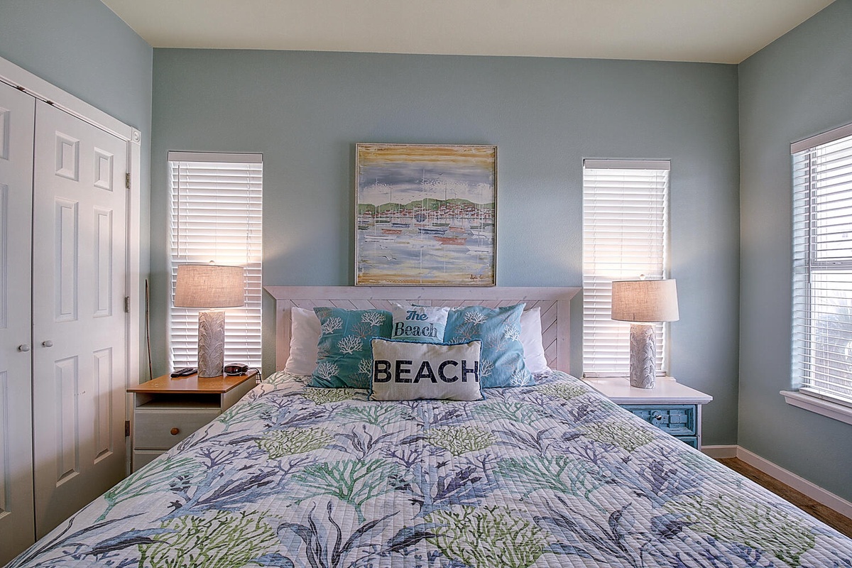 Drift off to sleep in this soothing coastal bedroom, where ocean-inspired bedding and soft lighting create your perfect seaside retreat.