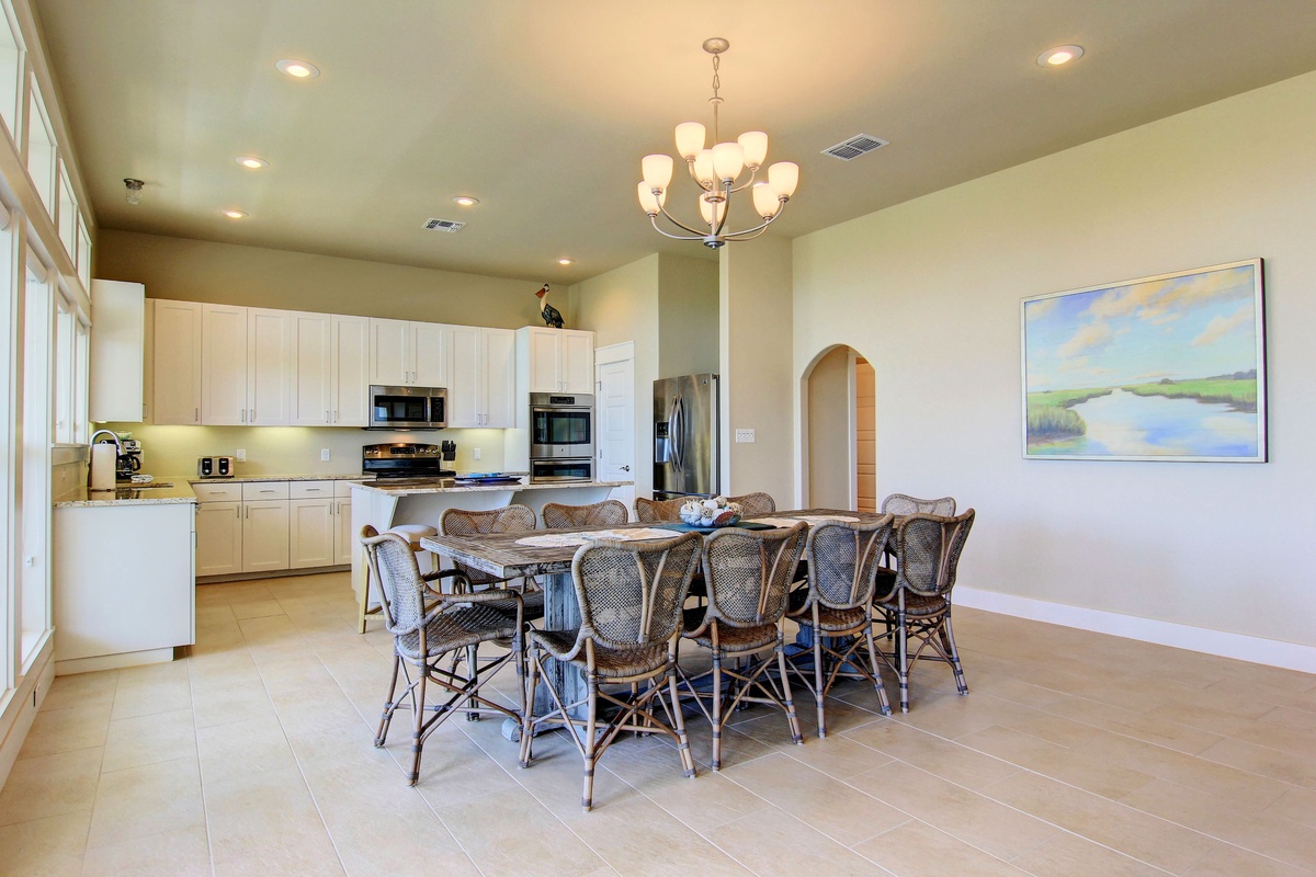 Gather around the large dining table in your bright, open kitchen where memorable meals await your whole group.
