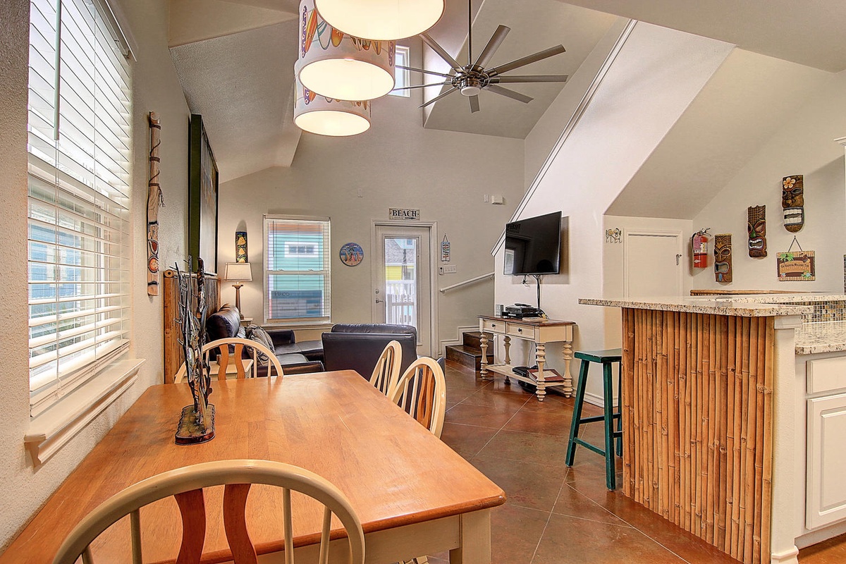 Your bright, open-plan retreat features tropical vibes with bamboo accents and comfortable seating where you can unwind.