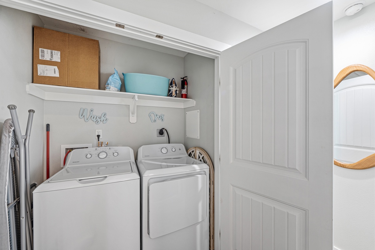 Your laundry nook is ready for effortless upkeep, with full-size washer and dryer, handy shelving for supplies, and everything you need to keep travel light and pack fresh.