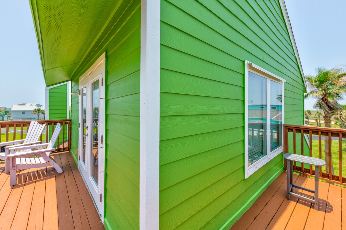 Step onto your private deck and sink into beach chairs overlooking tropical surroundings, perfect for morning coffee or evening relaxation.