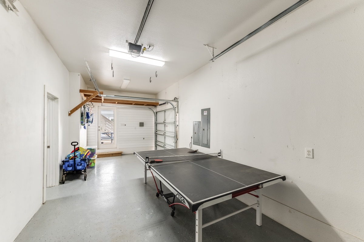 Your private garage doubles as a game room with ping pong table for friendly matches and storage for all your vacation gear.