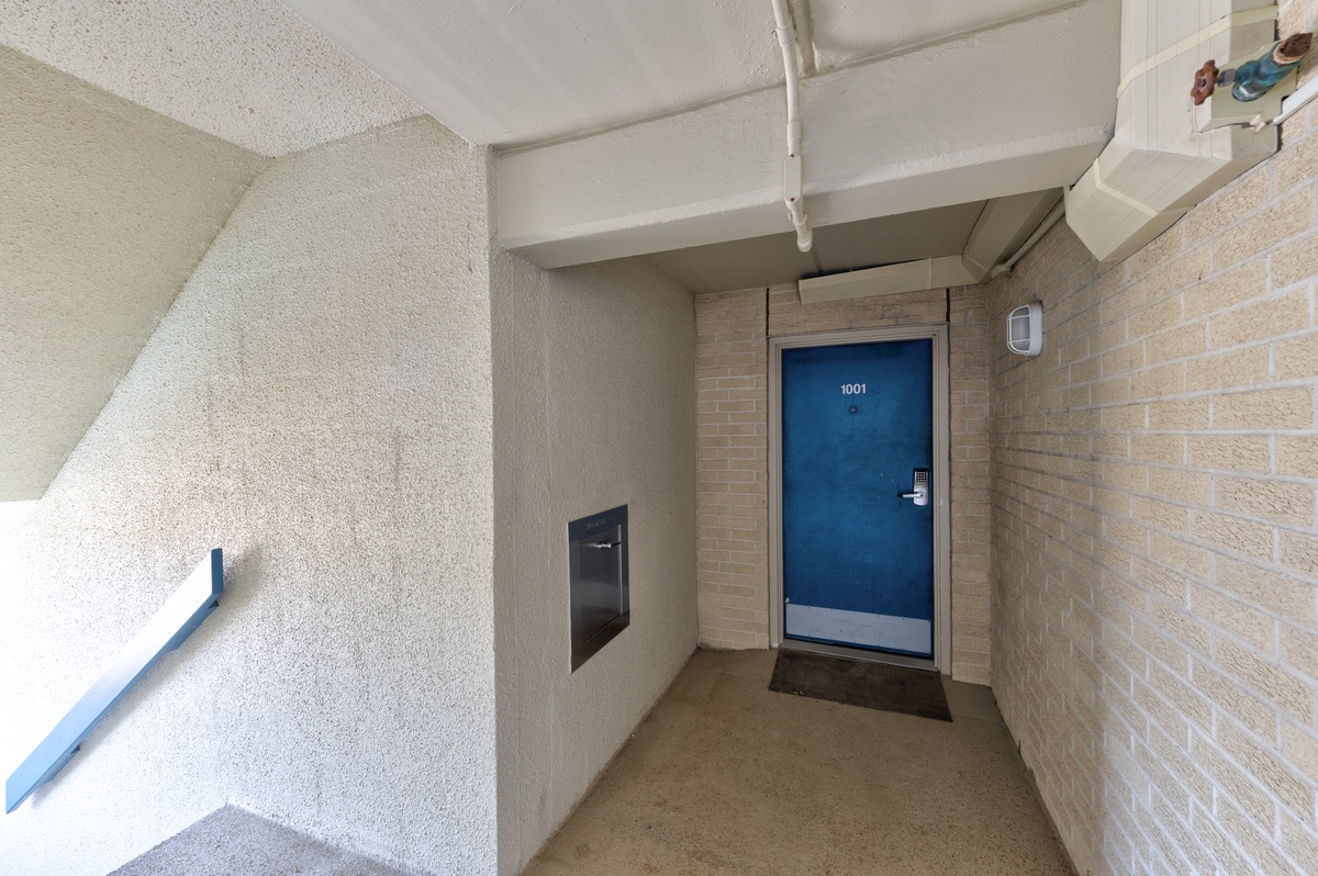Your private entrance awaits with secure access and contemporary design details that set the tone for your comfortable stay.