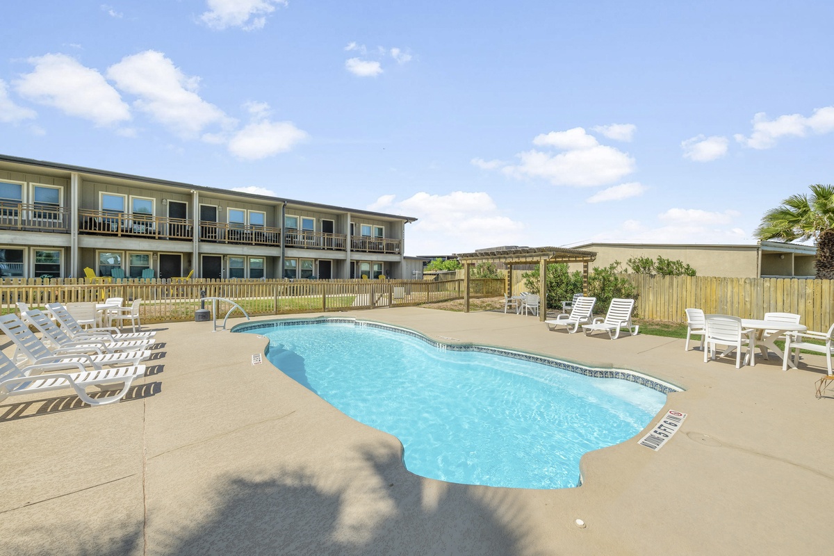 Sparkling pool area with comfortable loungers where you can soak up the sun and unwind in complete relaxation.