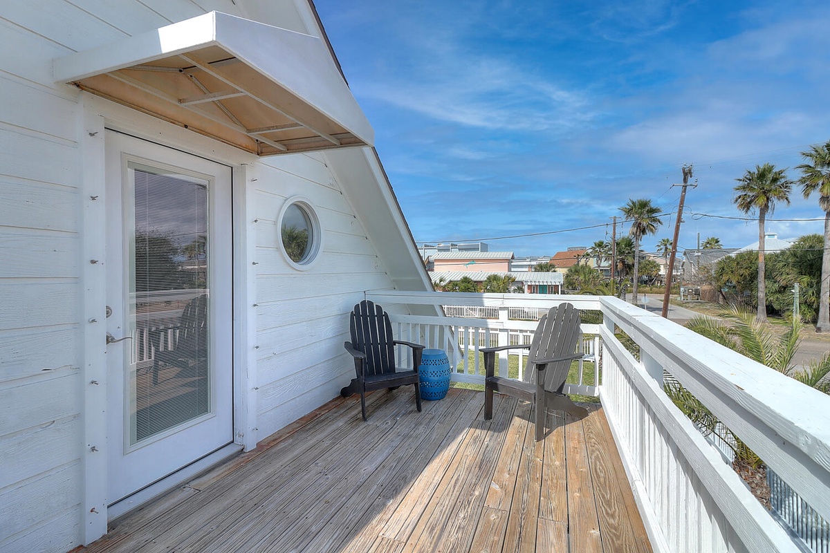 Step onto your private balcony where tropical views and two cozy Adirondack chairs invite you to unwind with morning coffee or evening cocktails.