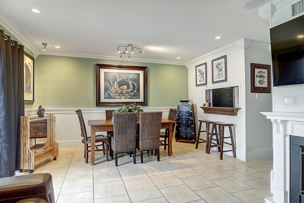 Step into your elegant dining space where warm wood tones and gentle lighting create the perfect atmosphere for memorable meals.