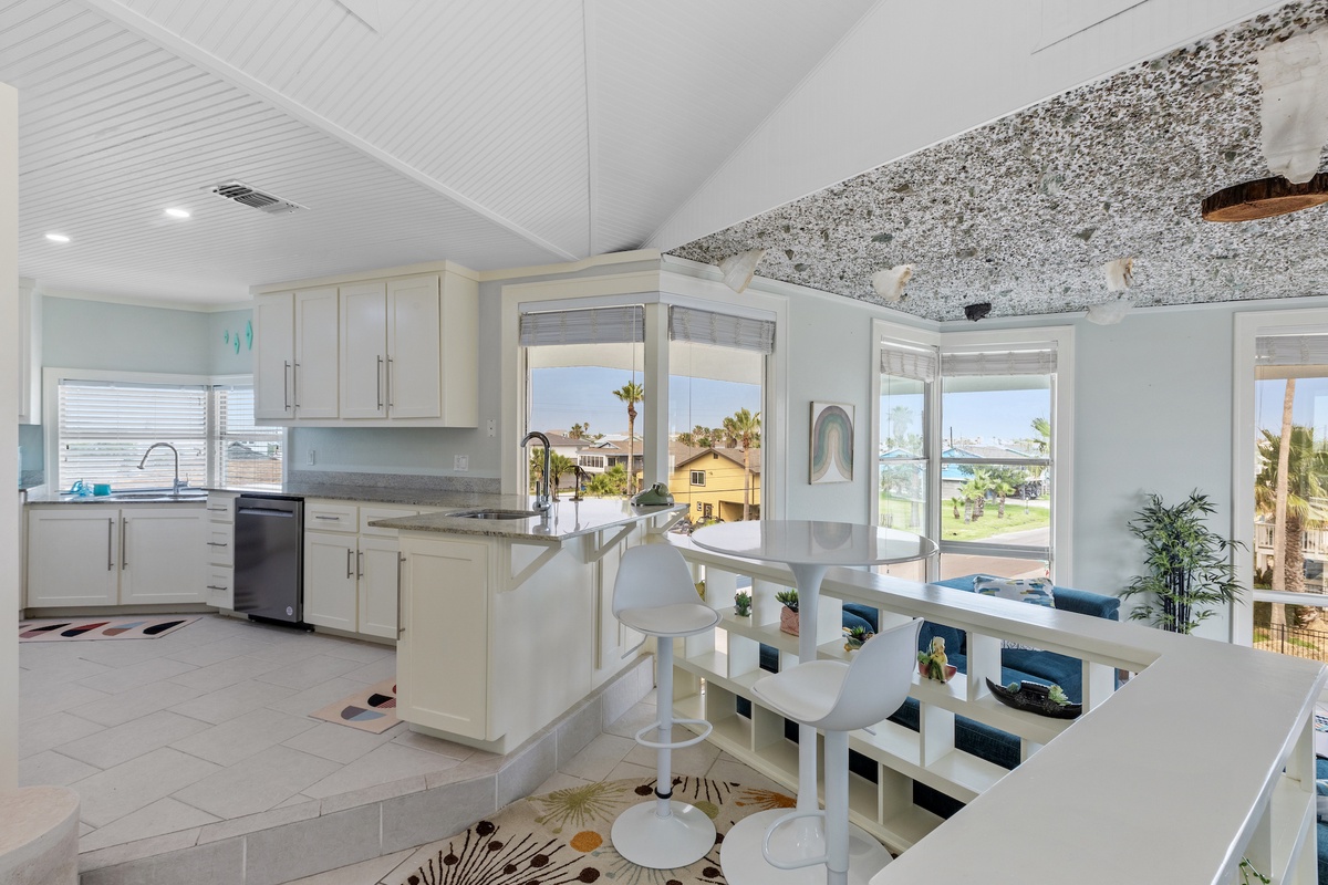 Cook in your bright, airy kitchen with stunning granite countertops and palm tree views through every window.
