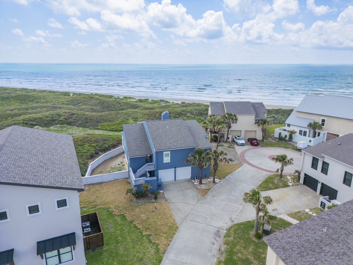 Beachfront community featuring coastal homes with ocean access and natural dune preservation.