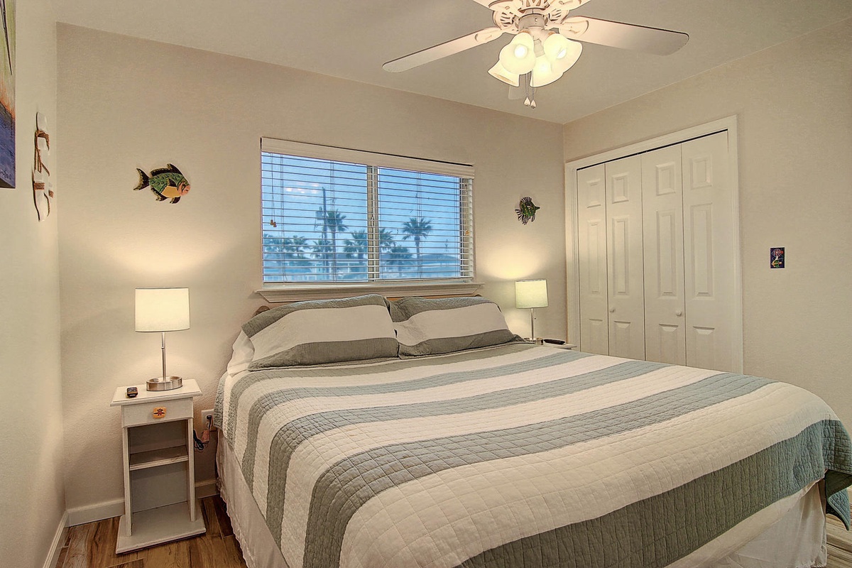 Drift off peacefully in your cozy bedroom with tropical touches and soothing coastal colors that invite restful sleep.