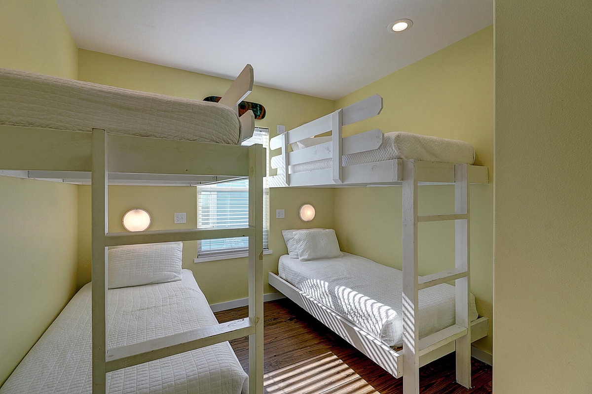 Cozy bunk room with reading lights creates your perfect space for rest and relaxation after adventurous days.