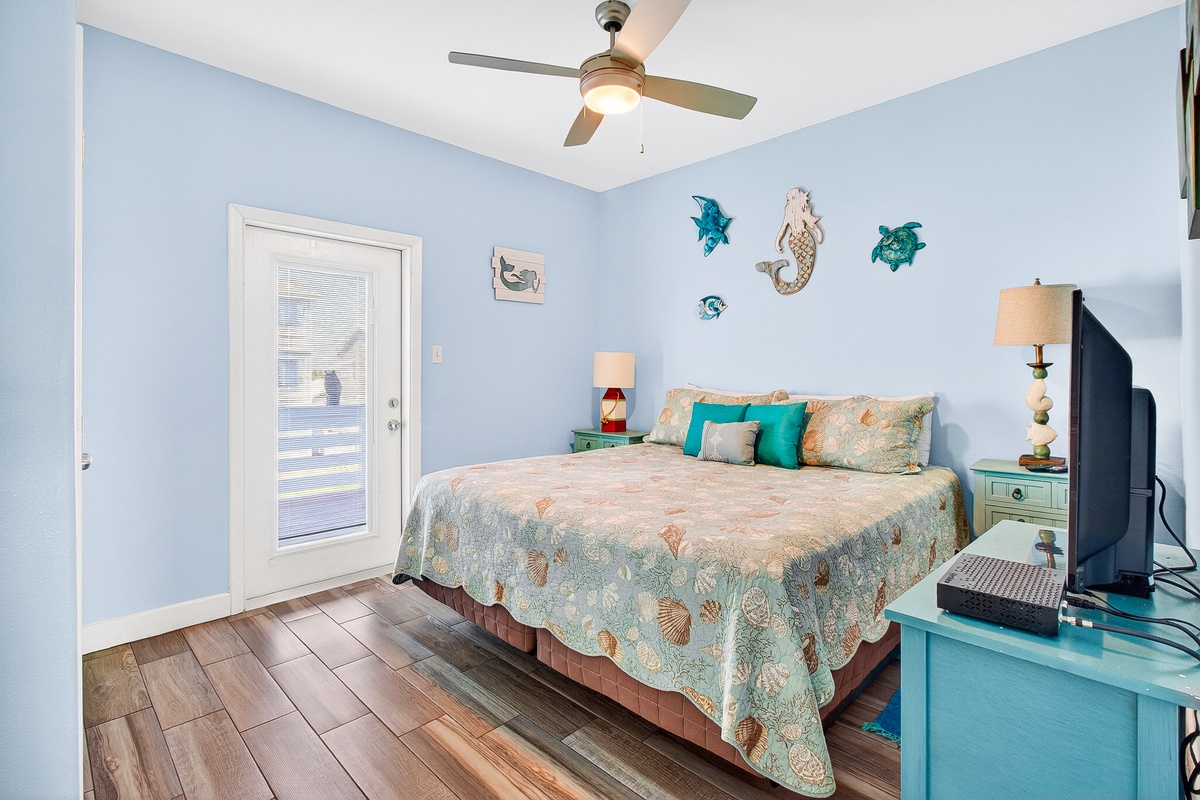 Drift off to sleep in your ocean-themed bedroom, where sea turtle art and coastal colors create a tranquil seaside escape.