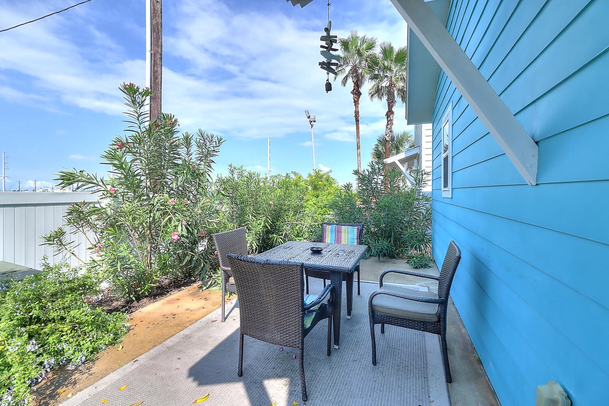 Relax on your private patio surrounded by tropical gardens, where morning coffee tastes better under swaying palms and endless blue skies.